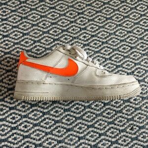 Nike Kids White Sneakers with Orange Swoosh